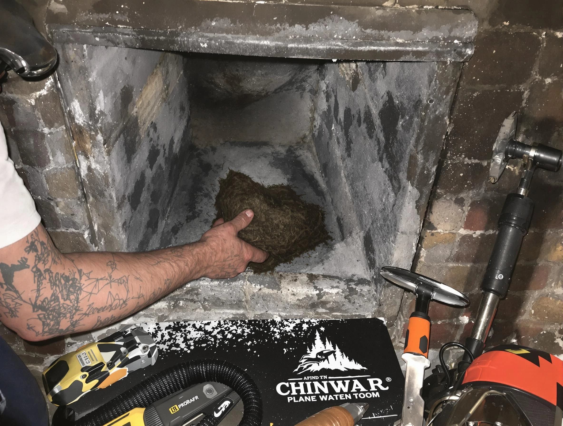 Irvington Chimney Sweep safely removing debris and screening chimney in Irvington, NJ